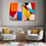 Nowoczesny obraz abstrakcyjny dyptyk z geometrycznymi i organicznymi kształtami w intensywnych kolorach – czerwieni, pomarańczu, błękicie, żółci i czerni, na jasnym tle.